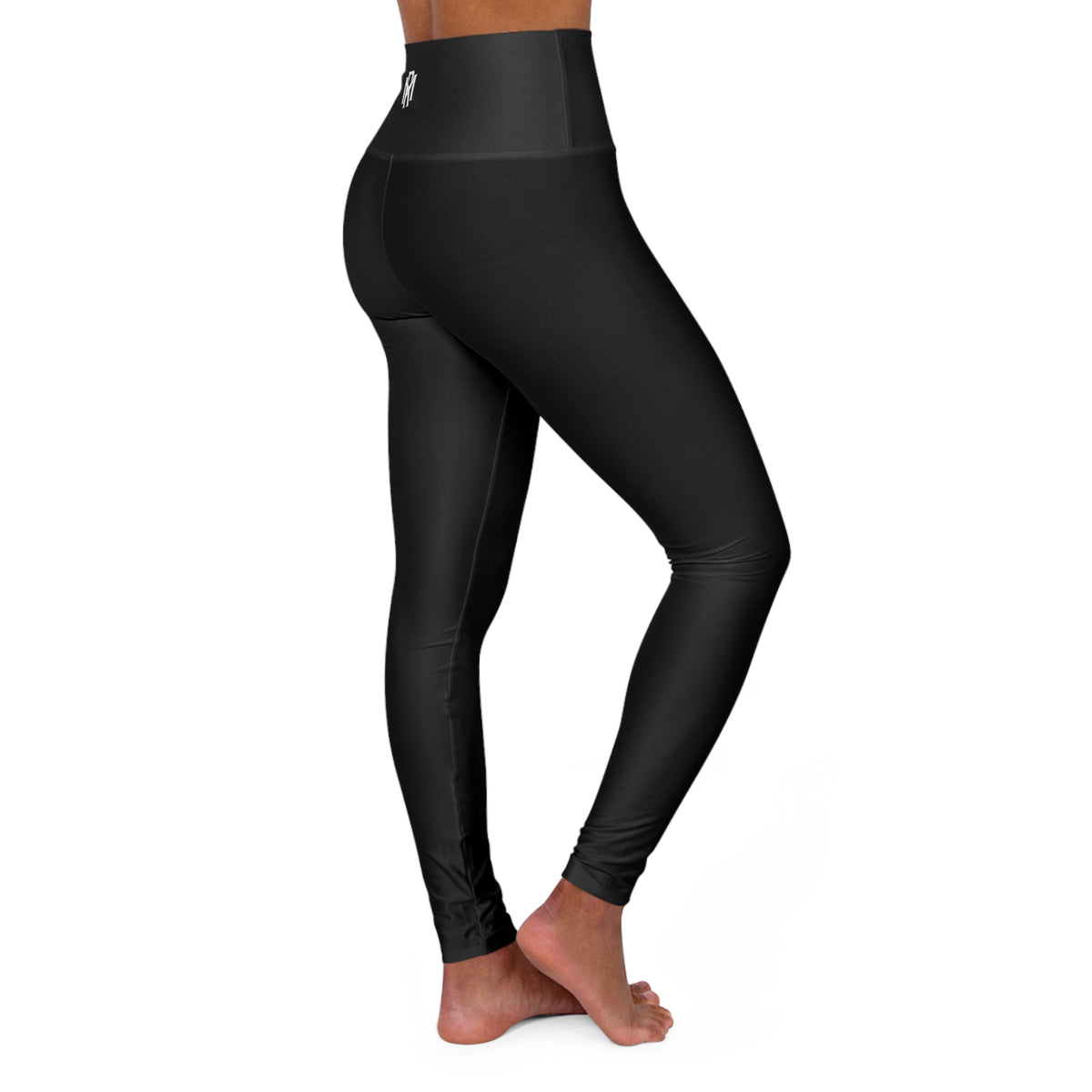 High-Waisted Black Yoga Leggings with Subtle Logo — Compression Activewear